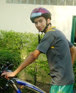 Benji going out to ride bicycle after school.